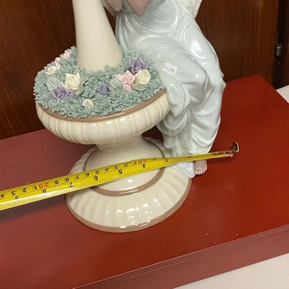Grandeur Noel Porcelain Angel sculpture in fountain